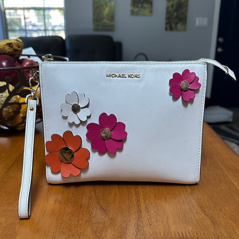 Michael Kors Daniela Large Wristlet with Pink and Orange Floral Accents.